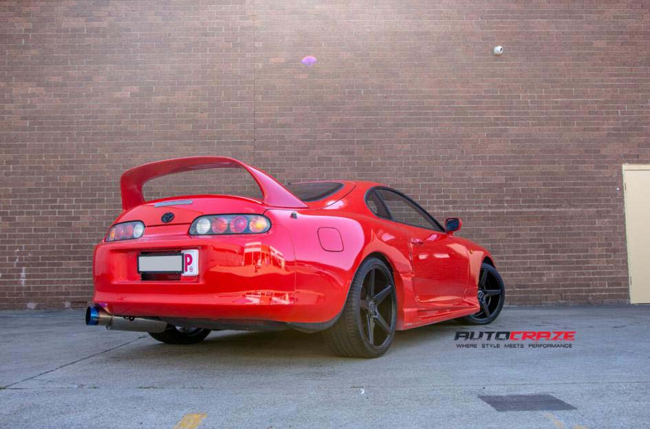 toyota supra with kmc district wheels rear wide angle shot february 2018